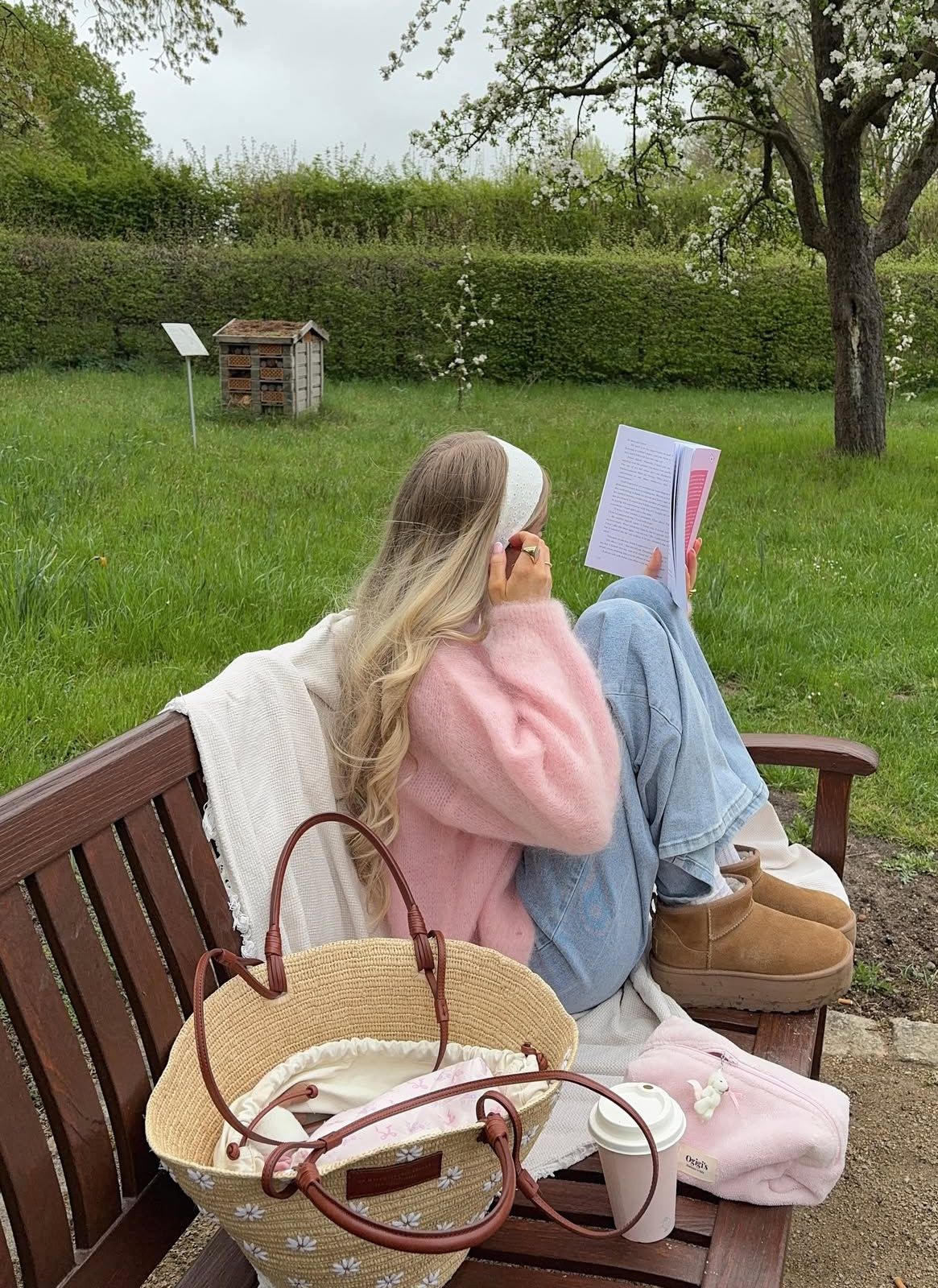 A person sitting quietly in morning light without a phone